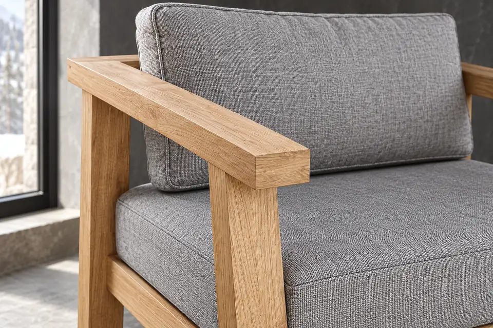 A teak armchair cushion edge